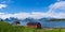 Lyngen Alps mountains and boathouses on Lyngenfjord Norway