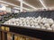 Lynnwood, WA USA - circa April 2022: Angled view of bulbs of garlic in the produce section of a Safeway grocery store