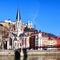 Lyon cityscape from Saone river with footbridge