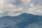 Lysa peek with transmitter, view from Smrk peek, Beskydy mountains during summer with cloudy sky