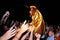 M.I.A., a rapper named Mathangi Maya Arulpragasam, surrounded by fans during her performance at FIB Festival