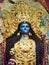 Maa kali goddess of power with blue face red tongue with golden crown