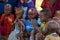 Maasai African kids singing a song under Acacia tree as outdoor school in Tanzania, East Africa