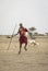 Maasai men practicing throwing a spear