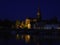 Maastricht at night, the Dutch city on the river Maas with boats