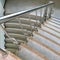 Mable steps with stainless balustrades.