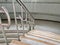 Mable steps with stainless balustrades.