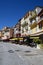Macadam road with houses and restaurants in Villefranche Sur Meer in France