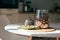 Macadamia nuts lie in a bowl in the kitchen, hard morning light