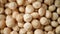 Macadamia nuts rotation. Food ingredient background. Vegan, vegetarian diet. Healthy lifestyle. Natural dry fruits and