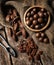 Macadamia, Pecan and Pili nuts on wooden table