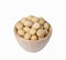 Macadamia in wooden bowl, isolate background