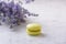 Macaron and bunch lavender on white natural marble table