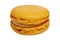 Macaron isolated. Close-up of a single original french yellow lemon macaroon cookies isolated on a white background. Pastries,