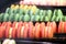 Macaron multicolor french confectionery in a tea shop window