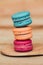 Macaron sweet dessert on wood background