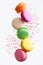 Macaron Sweets. Colorful Macaroons Flying