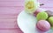Macaron wooden background rosesweet cake france pastel gastronomy
