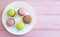 Macaron wooden background white plate sweet cake pastelgastronomy