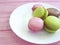 Macaron wooden background white plate tasty cake pastelgastronomy