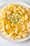 Macaroni creamy corn cheese on plate