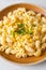 Macaroni creamy corn cheese on plate