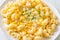 Macaroni creamy corn cheese on plate