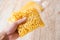 Macaroni in package in hand / raw macaroni vermicelli pasta product dry food non perishable food