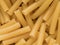 Macaroni pasta tubes food background