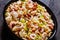 Macaroni salad with shrimps, mussels, fish, leek