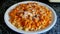 Macaroni with tomato sauce and grated parmesan cheese