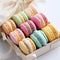 Macarons in a box, colors,AI generated.