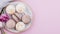 Macarons plate with roses copy space . High quality and resolution beautiful photo concept
