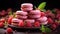 Macarons with red berries in a rustic setting