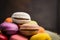 Macarons various on dark background