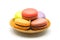 Macarons in wooden plate