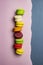 Macaroons top view colorful straight line pink dessert france