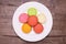 macaroons on white porcelain plate