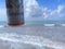 MACEIO, AL, BRAZIL - May 12, 2019: Budweiser cold beer and a beautiful sky and sea behind