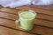 Macha Latte glass on wooden panels table