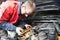 Machanic repairman at automobile car engine repair