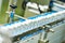 Machine conveyor with glass bottles ampoules