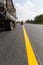 Machine eject and worker on road and traffic sign painting