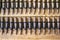 Machine gun ammo on a wooden table, bullet belt, bandoleer, chain of ammo on wooden background,cartridge 7.62 mm caliber, top view