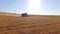 Machine Harvester Working On Ripe Wheat Field