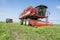 Machine harvesting pea beans harvested in the field