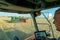 The machine operator at the helm of a modern combine harvester harvests grain