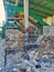Machine press working at waste recycling site