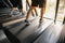 Machine treadmill with people running closeup at fitness gym