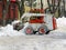 Machinery snowblower. Natural disasters winter, blizzard, heavy snow paralyzed the city, collapse. Snow covered the cyclone Europe